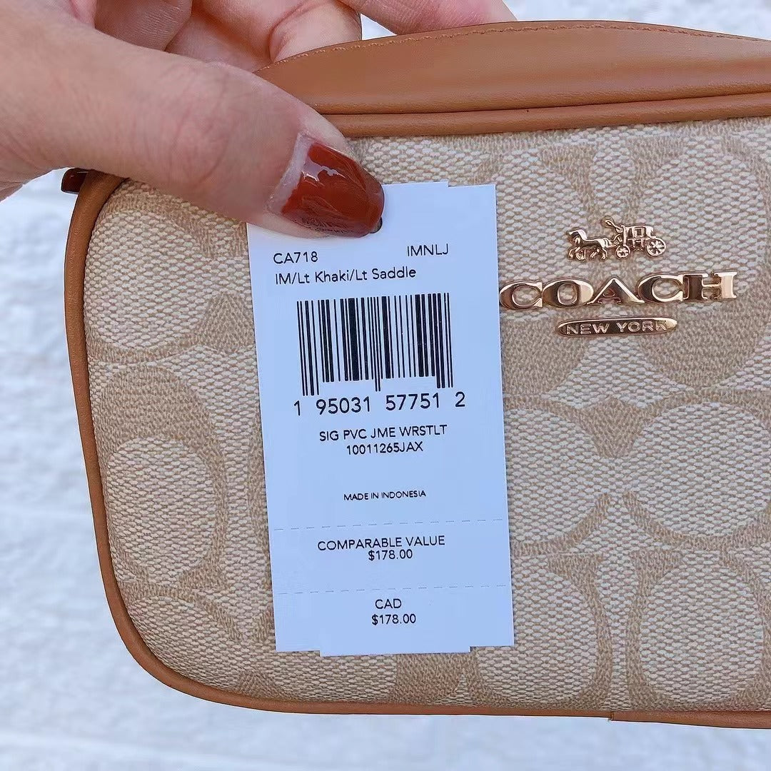 Coach CA718 Jamie Wristlet In Signature Canvas In Gold/Lt Khaki/Lt Saddle Coach CA718 Jamie Wristlet In Signature Canvas In Gold/Lt Khaki/Lt Saddle